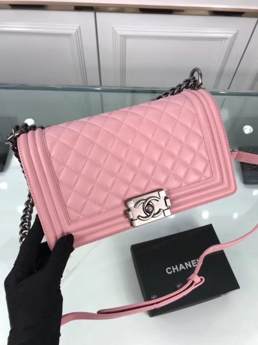 CHANEL 'Boy' Diamond Quilted Leather Flap Bag. Original Quality Bag including gift box, care book, dust bag, authenticity card. Created by Karl Lagerfeld, the iconic design owes its name to Gabrielle Chanel's first love, Boy Capel. This Chanel Boy Flap Bag Quilted is every woman's dream. Crafted from calfskin leather, the bag features Chanel's signature diamond quilting, chunky chain link strap with leather shoulder pad, and metal-tone hardware accents. Its CC Boy logo closure opens to a fabric-lined interior with slip pocket perfect for daily essentials. A sought-after, luxurious accessory.