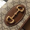 GUCCI 1955 GG Supreme Horsebit Wallet On Chain. Original Quality Wallet including gift box, care book, dust bag, authenticity card. This chain wallet in GG Supreme canvas and leather is introduced as part of the Gucci Horsebit 1955 accessories collection, defined by the double ring and bar design also found in Handbags. The folded snap-closure shape features several card slots and pockets, completed with a detachable chain strap.