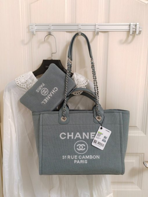 CHANEL Maxi Small Shopping Bag. Original Quality Bag including gift box, care book, dust bag, authenticity card. Luxuriously stylish and chic, this Chanel bag can carry all your essentials and other shopping items. This one is attention grabbing due to its large size and uniquely fun style. The logo comes in white lettering, proudly displaying that it’s a Chanel bag. The interwoven chained shoulder straps and the handles are two practical things you shouldn’t dare miss. Yes, it means you can carry it by the hand or over the shoulder. And just like your high-fashion denim jeans, this new oversized bag is made from denim, which means its durable, strong and easy to maintain.