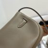 HERMÈS Swift Kelly Moove: Classic Elegance, Modern Flair. Discover the reimagined elegance of the Kelly Moove, where timeless style meets modern innovation. Building on the iconic silhouette of the beloved Kelly Banana bag, the Kelly Moove adds a fresh twist with an irresistibly chic detachable mini pouch on its strap. This miniature version of the Kelly is more than just a pretty accessory—it’s a practical companion perfect for holding essentials like AirPods or credit cards. Together, this mother-and-daughter duo brings both style and function to the forefront, making the Kelly Moove a must-have for those who appreciate classic design with a contemporary flair. Elevate your look with this sophisticated piece that seamlessly blends tradition with today’s needs.