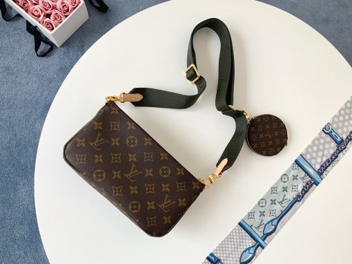 LOUIS VUITTON Monogram Multi Pochette Accessories. Authentic Quality Bag with literature, dust bag and authenticity card. The hottest bag of the season, the LV Monogram Multi Pochette features a hybrid of Pochettes in varying sizes coated in LV’s monogram canvas leather. The Pochette Accessoires, Mini Pochette Accessoires, and round coin purse also come with a removable Louis Vuitton inscribed Khaki strap and gold-tone chain.