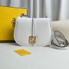 FENDI C’mon Medium. Timeless Elegance, Embodied in Leather. Elegantly designed, this medium-sized satchel bag boasts graceful, curved lines that exude femininity. Its elongated flap is adorned with a striking metal FF logo, adding a touch of sophistication to its overall charm. Crafted from supple leather with meticulously embossed edges and intricate details, this bag radiates a sense of refined luxury. The sides of the bag seamlessly blend with the overall design, crafted from the same tone-on-tone full-grain leather, ensuring a harmonious and visually pleasing aesthetic.