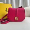 FENDI C’mon Medium. Timeless Elegance, Embodied in Leather. Elegantly designed, this medium-sized satchel bag boasts graceful, curved lines that exude femininity. Its elongated flap is adorned with a striking metal FF logo, adding a touch of sophistication to its overall charm. Crafted from supple leather with meticulously embossed edges and intricate details, this bag radiates a sense of refined luxury. The sides of the bag seamlessly blend with the overall design, crafted from the same tone-on-tone full-grain leather, ensuring a harmonious and visually pleasing aesthetic.