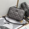 DIOR Caro Box Bag With Chain. Original Quality Bag including gift box, care book, dust bag, authenticity card. Maria Grazia Chiuri's Dior Caro box bag with chain is a modern creation. Crafted in calfskin, it stands out with a unique Macrocannage quilted effect and a spacious compartment, including three card slots, to accommodate all the daily essentials. The removable chain strap features a leather insert for comfortable and adjustable wear, either over the shoulder or crossbody, while the handle allows it to be carried by hand.