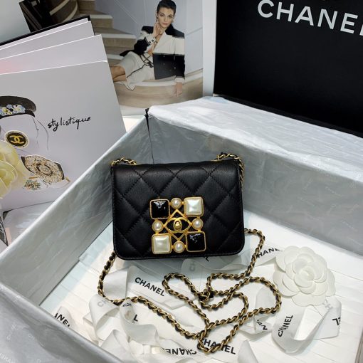 CHANEL Small Flap Bag with Crystal Pearls and Resin. Original Quality Bag including gift box, care book, dust bag, authenticity card. Chanel has introduced the Small Flap Bag in a bejeweled variant at Fall-Winter 2020/21 season. The bag is subtly blingy featuring faux pearls and Chanel’s Gripoix (poured glass jewels) on the clasp.