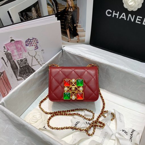 CHANEL Small Flap Bag with Crystal Pearls and Resin. Original Quality Bag including gift box, care book, dust bag, authenticity card. Chanel has introduced the Small Flap Bag in a bejeweled variant at Fall-Winter 2020/21 season. The bag is subtly blingy featuring faux pearls and Chanel’s Gripoix (poured glass jewels) on the clasp.