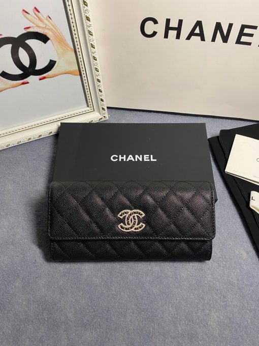 CHANEL CC Logo Flap Wallet. Original Quality Wallet including gift box, care book, dust bag, authenticity card. This latest wallet from CHANEL is crafted in luxurious quilted grained calfskin with a stylish Chanel CC logo. The wallet opens to a leather interior with card slots and a zippered compartment.