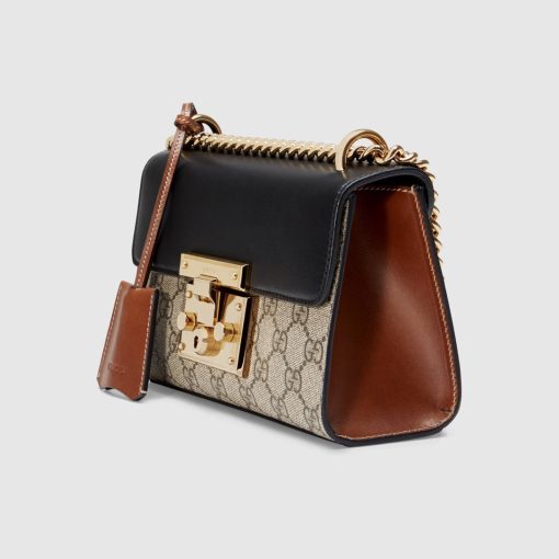 GUCCI Padlock GG Shoulder Bag. Original Quality Bag with literature, dust bag, gift box, and authenticity card. Crafted from smooth calf leather and the label's iconic GG-printed canvas, the Padlock shoulder bag from Gucci is an investment piece that will prove its worth. The bag is given a classic, glamorous finish with gold-tone hardware for the ultimate sophisticated touch. Carry it over your shoulder as a crossbody or in the crook of your arm.