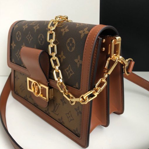 LOUS VUITTON Dauphine MM Shoulder Bag. Original Quality Bag. Authentic Style. Genuine Calf Leather. Metal Hardware. Authentic Packaging. Original Quality Dust Bag. For Spring-Summer 2019 Nicolas Ghesquière unveils a new must-have: the Dauphine Mini handbag. This adorable compact model is crafted from Monogram and Monogram Reverse canvas, trimmed with smooth tan calfskin. The high-shine LV lock and leather smart strap add a modern twist to this signature piece, which is perfectly sized for day-to-evening wear.