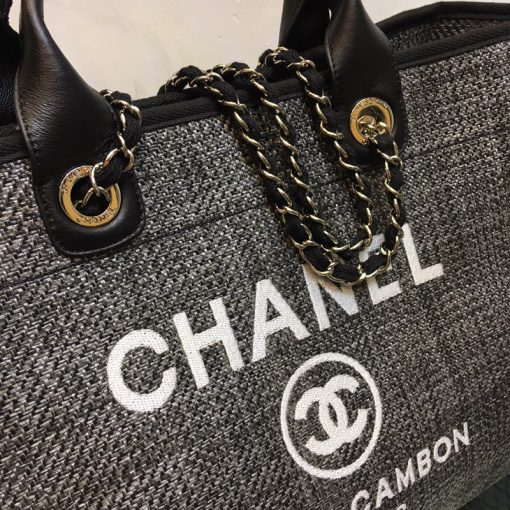 New Small CHANEL Deauville Tote. Authentic Quality Bag with literature, dust bag, gift box and authenticity card, payment slip. This is an original quality CHANEL Denim Canvas Small Deauville Tote. This lovely and best-selling tote is crafted in fine denim canvas printed with a CHANEL stitched logo. The bag features metal threaded chain shoulder straps with leather shoulder pads, canvas trim, and an open top. The bag opens to a spacious fabric interior with zipper and patch pockets. Enjoy this timeless style for everyday needs and shopping.