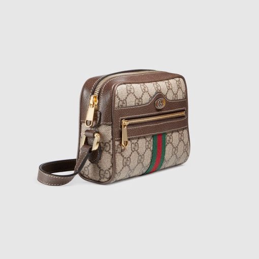 GUCCI Ophidia Small GG Supreme Camera Crossbody Bag. Original Quality Bag. Authentic Style. Authentic Packaging. Original Quality Dust Bag. Gucci camera crossbody bag in GG Supreme canvas, a material with low environmental impact. Leather trim with signature web accents. Adjustable shoulder strap, 65.0cm drop. Zip top closure. Exterior, front zip pocket. Interior, one zip pocket. One slip pocket. Founded in Florence in 1921, Gucci is one of the world's leading luxury fashion brands, with a renowned reputation for creativity, innovation and exceptional craftsmanship.