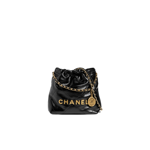 CHANEL 22 Mini Handbag. Original Quality Bag including gift box, care book, dust bag, authenticity card. The Chanel 22 Handbag, has a shape, versatility, and buzz all its own, bringing a casual, even bohemian flare to the always-dressed fashion house. This is crafted of diamond-stitched calfskin leather. The bag features leather threaded silver chain shoulder straps and a matching Chanel logo on the front. The open top with magnetic closure leads to a black fabric interior with a zipper pocket and a removable pouch.