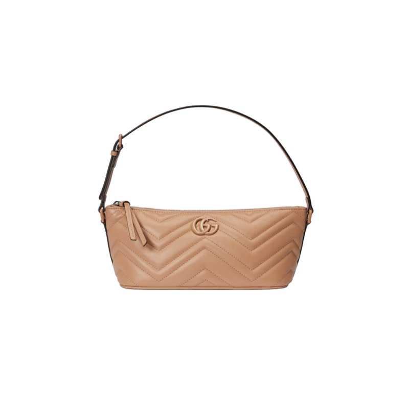 GUCCI GG Marmont Shoulder Bag. Original Quality Bag including gift box, care book, dust bag, authenticity card. The GG Marmont has become synonymous with the House, thanks to its recognizable matelassé fabric and Double G hardware. Continuously reinvented through the seasons, new shapes are introduced within this signature line, matching Gucci's contemporary vision. Presented here in chevron leather, it's further enriched with tonal details.