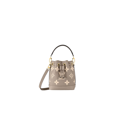 LOUIS VUITTON Nano Noé. Style meets functionality: the perfect companion for your everyday essentials. The Nano Noé in a bicolor design is made from Monogram Empreinte leather, showcasing the embossed Monogram pattern. This compact version of the iconic Noé bag adds a touch of elegance to your daily essentials. Along with a convenient drawstring closure, it also offers versatility with a detachable handle and an adjustable shoulder strap for various carrying choices.