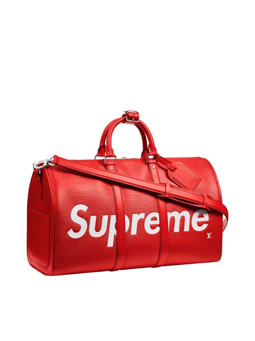 LOUIS VUITTON X SUPREME. Original Quality Bag including gift box, care book, dust bag, authenticity card. Epi leather, introduced 1985, became the first permanent leather collection of Louis Vuitton, and is tanned with plant extracts before dying. The process allows for colors as vibrant as this shade of red to stand out. Introduced in 1930, the Louis Vuitton Keepall was one of the first bags ever made by Louis Vuitton that is still in production today. Supreme debuted in 1994,140 years after Louis Vuitton was founded in Paris. Louis Vuitton’s collaboration with Supreme, dubbed the “coolest streetwear brand in the world right now” by GQ, was first shown at Paris Men’s Fashion Week in January 2017. Both stylish and practical, the Louis Vuitton x Supreme Keepall Bandouliere 45 is the perfect personification of classic LV and the highly sought after Supreme brand of cool.