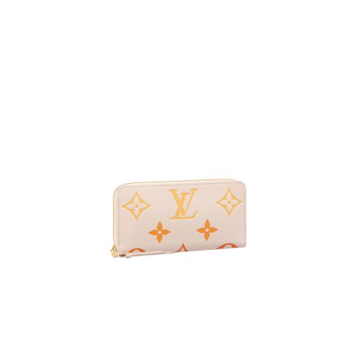 LOUIS VUITTON Zippy Wallet – Where Luxury Meets Functionality. Presenting the exquisite Zippy wallet, a coveted piece from the LV Gradient collection for this season. Meticulously fashioned using grained, embossed Monogram Empreinte leather, it showcases a gracefully transitioning spectrum of summery hues. This iconic wallet is distinguished by its sleek, slender profile, dependable zip closure, and ingeniously designed interior replete with an array of card slots, pockets, and compartments, ensuring both style and functionality in one harmonious package.