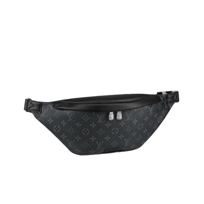 LOUIS VUITTON Discovery Bum Bag. Combining casual sophistication with contemporary practicality, the Discovery Bumbag is the perfect city companion. It is fashioned from Monogram Eclipse canvas/Monogram Shadow leather and adorned with zipped pockets on the front and back for easy access. With its adjustable belt and body-friendly design, it can be worn stylishly slung across the chest, draped over the shoulder or simply strapped around the waist.