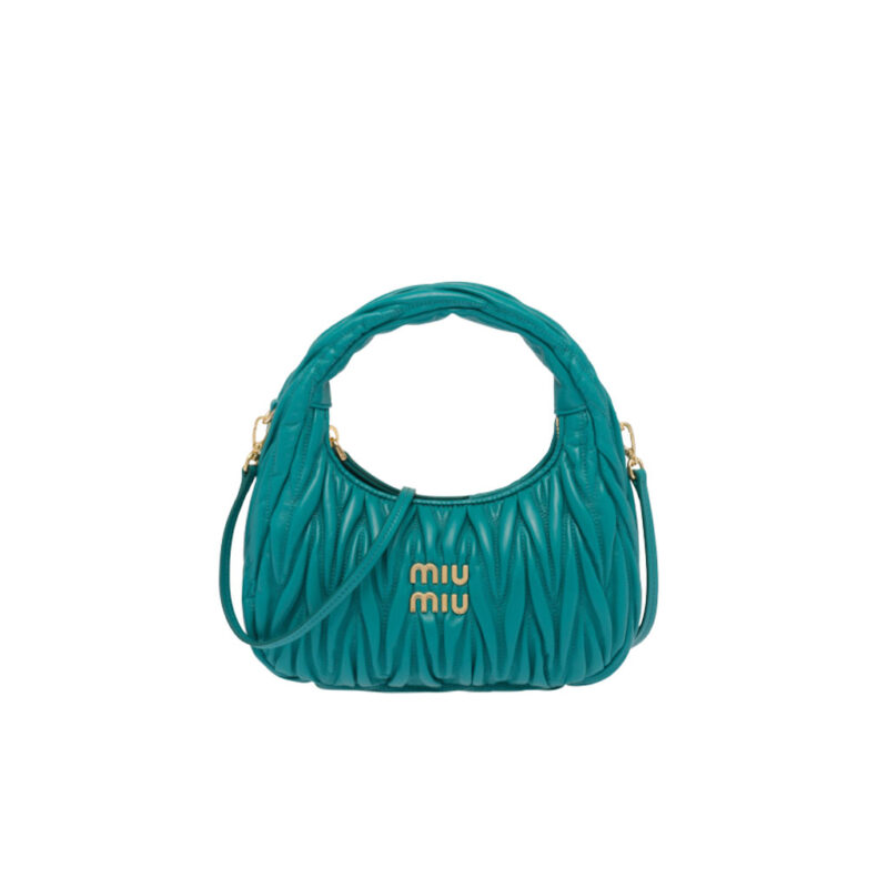 MIU MIU Wander Matelassé Mini Hobo Bag. Original Quality Bag including gift box, care book, dust bag, authenticity card. The Miu Wander bag is reinterpreted season after season, becoming an iconic accessory of Miu Miu collections. Made of matelassé nappa leather, the bag is characterized by the sophisticated, three-dimensional effect created by the refined workmanship. The hobo shape, blending retro inspirations and contemporary elegance, becomes a new synonym of modern femininity.