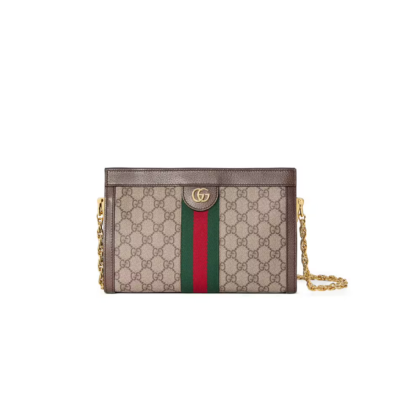 GUCCI Ophidia GG Supreme Chain Strap Shoulder Bag. Original Quality Bag including gift box, care book, dust bag, authenticity card. Crafted in GG Supreme canvas with inlaid Web stripe detail, the chain strap shoulder bag boasts a vintage inspired design. The style's familiar structured shape is reimagined as a petite shoulder bag, adorned with the line's emblematic logo details, secured with a magnetic closure and trimmed with leather. Drawing on retro influences, the Ouverture collection plays with dimensions by bringing a miniature designs to the fore.