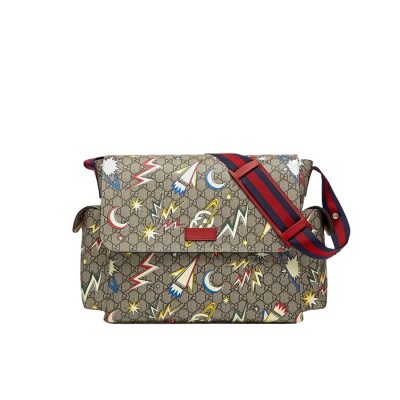 GUCCI GG Supreme Baby Changing Bag. Original Quality Bag including gift box, care book, dust bag, authenticity card. A baby changing bag crafted from Supreme canvas is animated by a print that recalls outer space–a theme used throughout Gucci's collections. Set against the House's emblematic monogram motif, the baby changing diaper bag is defined by spaceships, stars, and images from the galaxy. Also, outer space continues to influence Gucci's latest collections in new, whimsical ways.