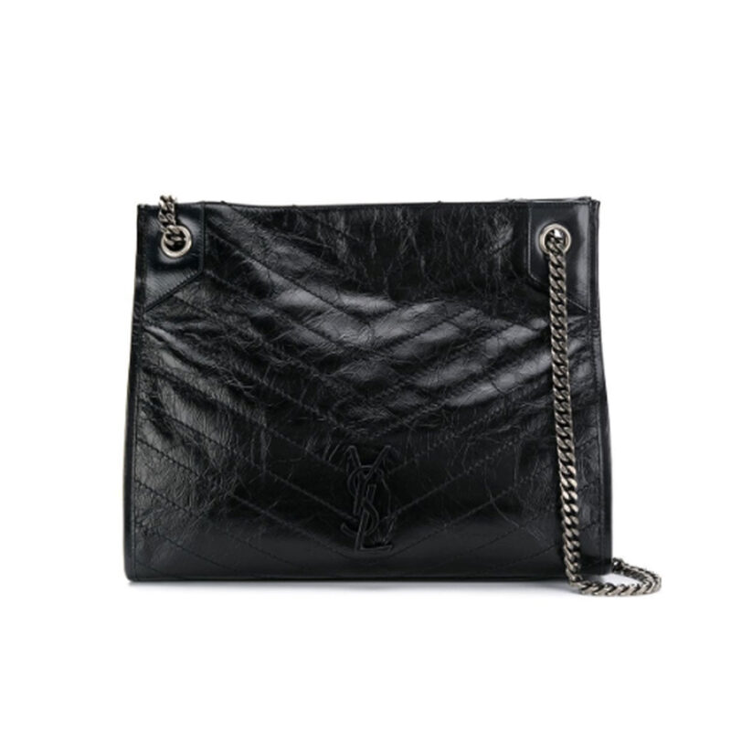 SAINT LAURENT Niki Tote. Original Quality Tote including gift box, care book, dust bag, authenticity card. This is an oversized and sophisticated handbag with a touch of vintage. This Niki Bag is crafted to take you back in time. It’s designed in Monogramme with Chevron Quilting. But what’s more interesting is the calfskin leather; it’s crumpled just like the aged calfskin leather. The crumpled-effect makes it look like its been worn, which is a part of the vintage appeal.