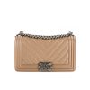 CHANEL Chevron Quilted Leather Flap Bag. Original high quality bag. Authentic design. Original quality printed dust bag and sales box. Created by Karl Lagerfeld, the iconic design owes its name to Gabrielle Chanel's first love, Boy Capel. This Chanel Boy Flap Bag Quilted is every woman's dream. Crafted from calfskin leather, the bag features Chanel's signature chevron quilting, chunky chain link strap with leather shoulder pad, and metal-tone hardware accents. Its CC Boy logo closure opens to a fabric-lined interior with slip pocket perfect for daily essentials. A sought-after, luxurious accessory.
