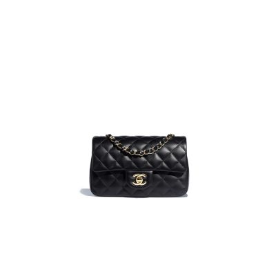 CHANEL Classic New Mini 20 cm Flap Bag. Original Quality Bag including gift box, care book, dust bag, authenticity card. This chic petite shoulder bag is crafted of luxurious shimmery lambskin leather. The crossbody bag features a long chain-link leather threaded shoulder strap and front flap with a CC turn lock. The flap opens to an interior of matching leather with zipper and patch pockets. Enjoy this fabulous bag for everyday essentials or special events with this timeless classic.