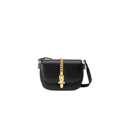 GUCCI Sylvie 1969 Mini Shoulder Bag. Original Quality Bag including gift box, care book, dust bag, authenticity card. Introduced in a mini size for Pre-Fall 2020, the Sylvie 1969 shoulder bag is designed with its original archetype in mind, unifying the details of its archival inspiration with a contemporary spirit. The shoulder bag in textured leather is defined by a narrow gold-toned metal chain fitted to the flap. The softly rounded silhouette is completed with an adjustable strap that can be worn on one shoulder or cross body.