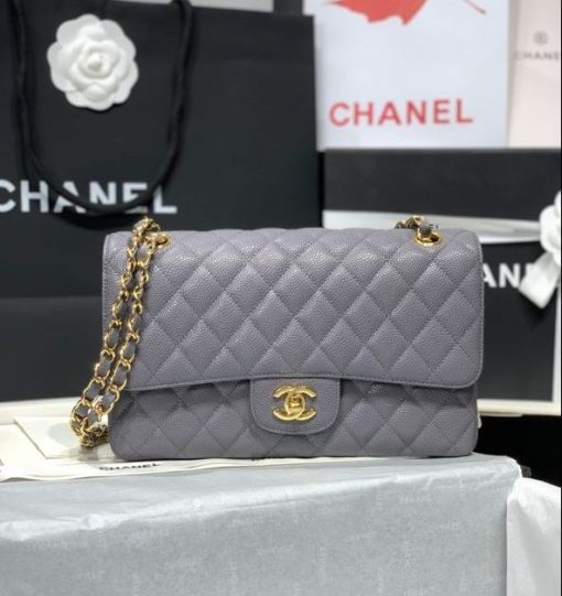 CHANEL Medium Classic Flap Bag. Original Quality Bag. CHANEL Sales Box and Dust Bag. Booklet, Authenticity Card, Payment Slip. Whether you’re a young celeb looking to carry a flashy mini bag in front of the paparazzi or a corporate maven looking for a roomy day bag that announces that you’ve arrived. Many sizes, colors and variations on the Classic Flap mean that there’s likely a version that will suit your purposes. The bags tend to hold their value well for years.