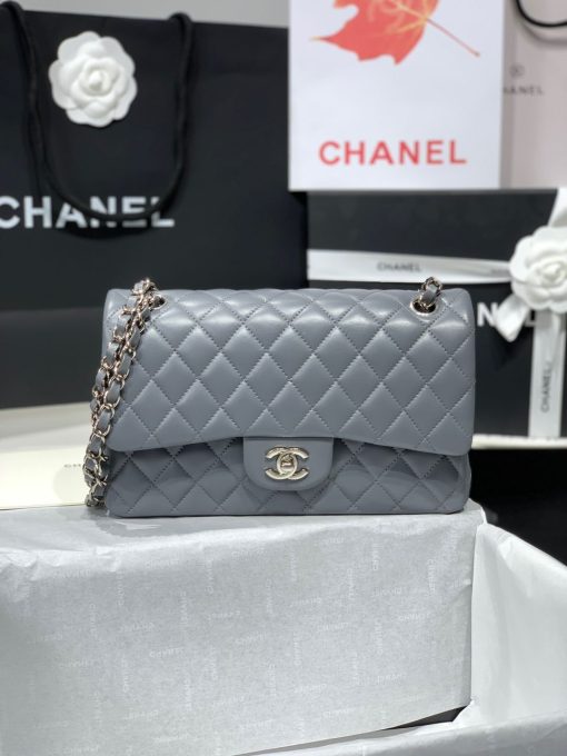 CHANEL Medium Classic Flap Bag. Original Quality Bag. CHANEL Sales Box and Dust Bag. Booklet, Authenticity Card, Payment Slip. Whether you’re a young celeb looking to carry a flashy mini bag in front of the paparazzi or a corporate maven looking for a roomy day bag that announces that you’ve arrived. Many sizes, colors and variations on the Classic Flap mean that there’s likely a version that will suit your purposes. The bags tend to hold their value well for years.