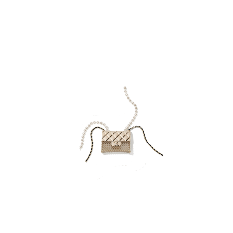 CHANEL Long Necklace. This CHANEL Long Necklace- Gold, Black & Pearly White is part of the Spring-Summer 2021 fashion collection. The artistry and craftsmanship of the House of CHANEL.