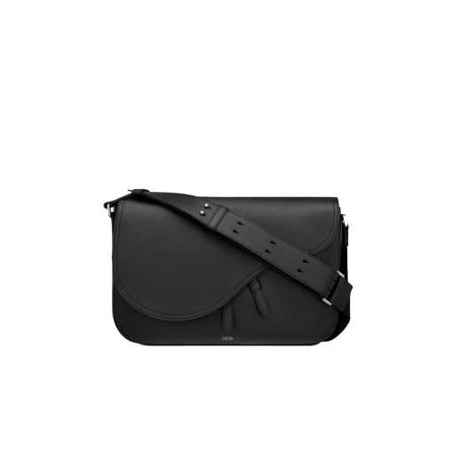 DIOR Saddle Messenger Bag. Original Quality Bag including gift box, care book, dust bag, authenticity card. The Saddle messenger bag is a subtly elegant classic shape. Crafted in black grained calfskin, it is embellished with a flap featuring Saddle lines, and is further enhanced with a 'DIOR' signature. Its adjustable shoulder strap allows it to be worn over the shoulder or crossbody, while the spacious interior is completed with a patch pocket and can hold a 13-inch laptop, documents and a tablet.