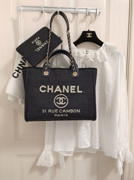 CHANEL Maxi Small Shopping Bag. Original Quality Bag including gift box, care book, dust bag, authenticity card. Luxuriously stylish and chic, this Chanel bag can carry all your essentials and other shopping items. This one is attention grabbing due to its large size and uniquely fun style. The logo comes in white lettering, proudly displaying that it’s a Chanel bag. The interwoven chained shoulder straps and the handles are two practical things you shouldn’t dare miss. Yes, it means you can carry it by the hand or over the shoulder. And just like your high-fashion denim jeans, this new oversized bag is made from denim, which means its durable, strong and easy to maintain.