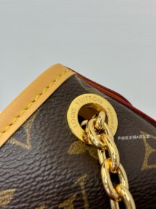 CarryAll BB. Authentic quality luxury bag crafted in genuine leather comes with authenticity card, dust bag and gift bag. Effortless Elegance, Day to Night – The CarryAll BB Reimagined. The iconic CarryAll BB returns this season with a stylish twist, perfect for transitioning from day to evening. Expertly crafted from the House’s signature Monogram canvas, it’s elevated with a gleaming gold-toned chain adorned with Monogram Flowers. Thoughtful details like the contrasting leather name tag and matching lace closure add a refined touch. Inside, a zipped pocket offers a convenient spot to keep your everyday essentials—like a credit card—close at hand. | PURSE POP UP LIVE CarryAll BB. Authentic quality luxury bag crafted in genuine leather comes with authenticity card, dust bag and gift bag. Effortless Elegance, Day to Night – The CarryAll BB Reimagined. The iconic CarryAll BB returns this season with a stylish twist, perfect for transitioning from day to evening. Expertly crafted from the House’s signature Monogram canvas, it’s elevated with a gleaming gold-toned chain adorned with Monogram Flowers. Thoughtful details like the contrasting leather name tag and matching lace closure add a refined touch. Inside, a zipped pocket offers a convenient spot to keep your everyday essentials—like a credit card—close at hand.