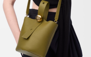 A clean, minimalist product shot of the Mini Pebble Bucket Bag by PURSE POPUP
