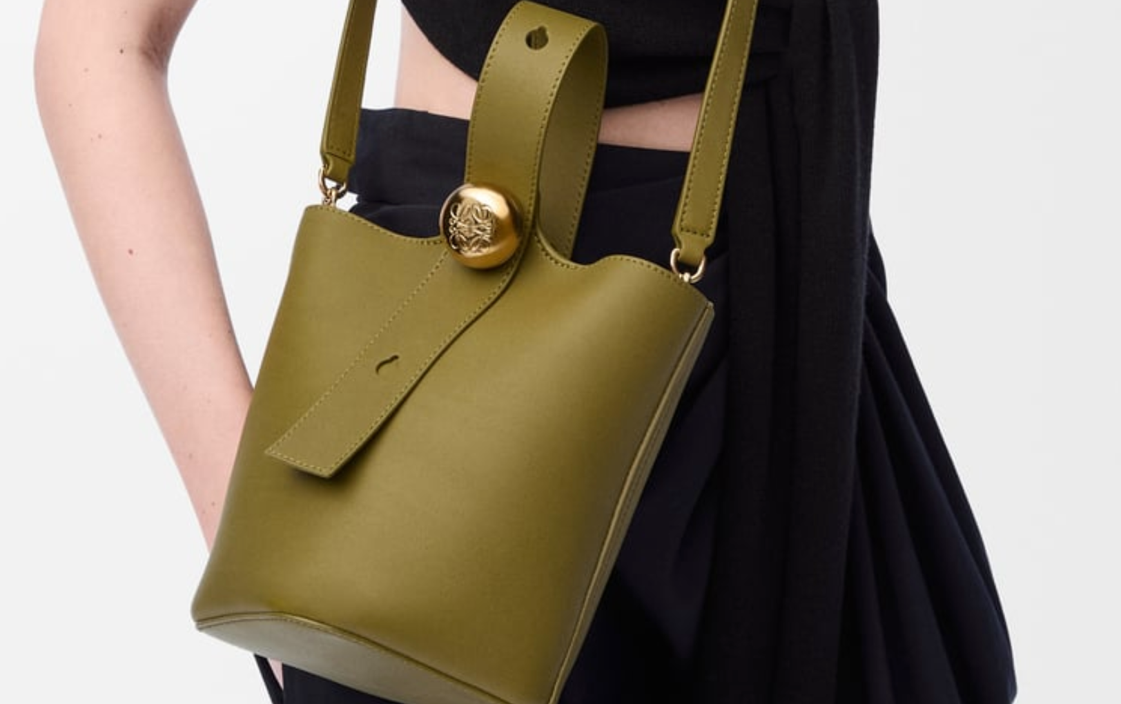 A clean, minimalist product shot of the Mini Pebble Bucket Bag by PURSE POPUP