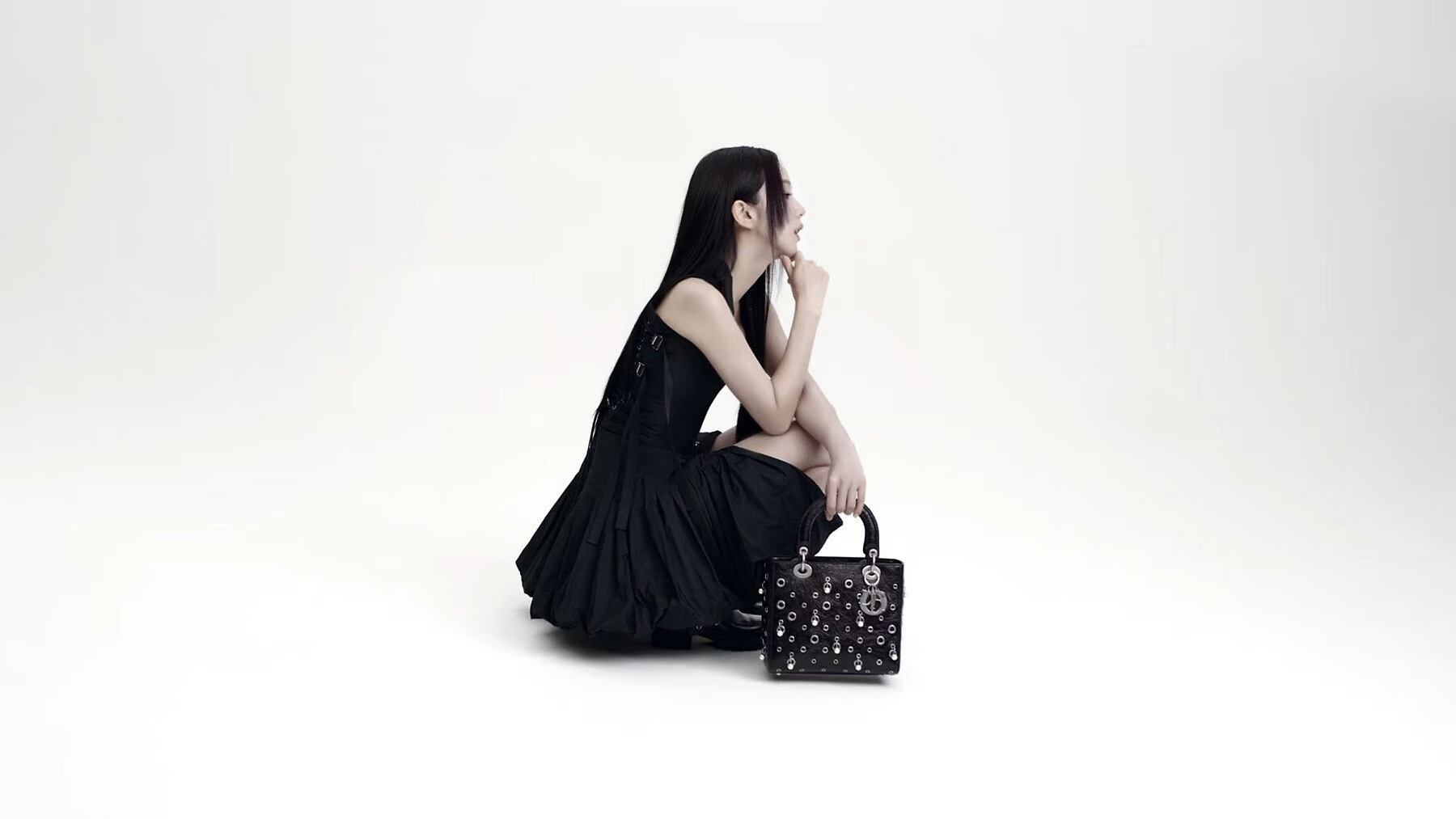 Trendy guest carrying a vibrant mini handbag