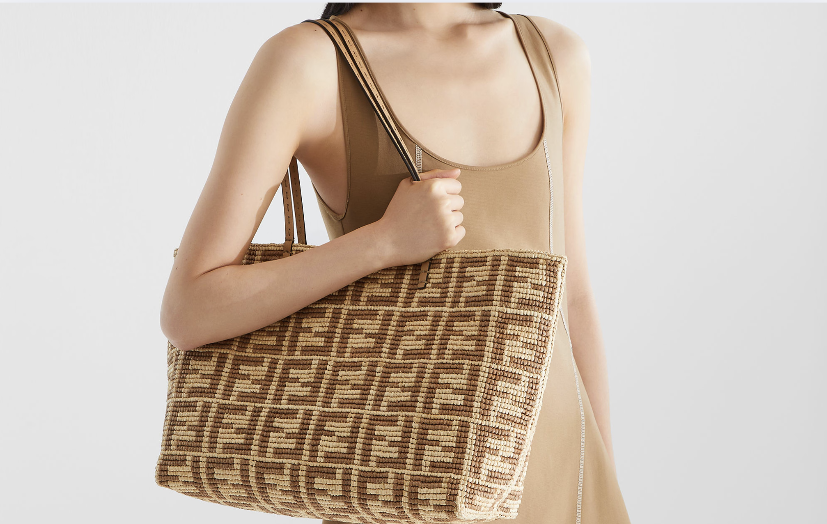 Stylish faux FENDI tote with vacation essentials