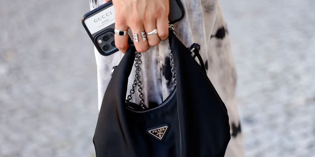 Faux PRADA bag paired with coffee and sunglasses