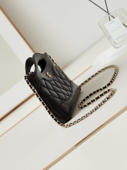 31 Nano Shopping Bag. Authentic quality luxury bag crafted in genuine leather comes with authenticity card, dust bag and gift bag. Small in size, grand in statement. A miniature marvel that captures the sophistication of *ANEL in its most playful form. Crafted with meticulous precision, this petite icon merges the timeless spirit of the *ANEL 31 with a modern twist on everyday elegance. Designed in supple lambskin and finished with gleaming gold-tone hardware, the Nano 31 doesn’t just carry your essentials — it carries your attitude. Whether worn crossbody, by hand, or dangling from the crook of your arm, this charming piece elevates every ensemble with a whisper of Parisian chic. Perfect for a night out or a day in the spotlight, it’s not just a bag — it’s your boldest accessory in its most compact form. Because luxury doesn't need to shout. Sometimes, it just needs to charm.