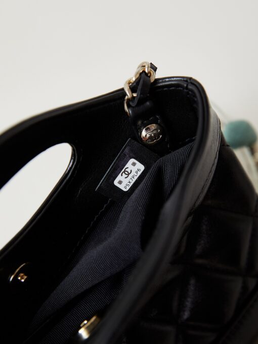 31 Nano Shopping Bag. Authentic quality luxury bag crafted in genuine leather comes with authenticity card, dust bag and gift bag. Small in size, grand in statement. A miniature marvel that captures the sophistication of *ANEL in its most playful form. Crafted with meticulous precision, this petite icon merges the timeless spirit of the *ANEL 31 with a modern twist on everyday elegance. Designed in supple lambskin and finished with gleaming gold-tone hardware, the Nano 31 doesn’t just carry your essentials — it carries your attitude. Whether worn crossbody, by hand, or dangling from the crook of your arm, this charming piece elevates every ensemble with a whisper of Parisian chic. Perfect for a night out or a day in the spotlight, it’s not just a bag — it’s your boldest accessory in its most compact form. Because luxury doesn't need to shout. Sometimes, it just needs to charm.