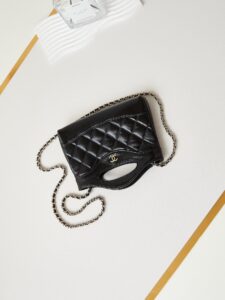 31 Nano Shopping Bag. Authentic quality luxury bag crafted in genuine leather comes with authenticity card, dust bag and gift bag. Small in size, grand in statement. A miniature marvel that captures the sophistication of *ANEL in its most playful form. Crafted with meticulous precision, this petite icon merges the timeless spirit of the *ANEL 31 with a modern twist on everyday elegance. Designed in supple lambskin and finished with gleaming gold-tone hardware, the Nano 31 doesn’t just carry your essentials — it carries your attitude. Whether worn crossbody, by hand, or dangling from the crook of your arm, this charming piece elevates every ensemble with a whisper of Parisian chic. Perfect for a night out or a day in the spotlight, it’s not just a bag — it’s your boldest accessory in its most compact form. Because luxury doesn't need to shout. Sometimes, it just needs to charm.