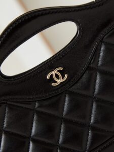 31 Nano Shopping Bag. Authentic quality luxury bag crafted in genuine leather comes with authenticity card, dust bag and gift bag. Small in size, grand in statement. A miniature marvel that captures the sophistication of *ANEL in its most playful form. Crafted with meticulous precision, this petite icon merges the timeless spirit of the *ANEL 31 with a modern twist on everyday elegance. Designed in supple lambskin and finished with gleaming gold-tone hardware, the Nano 31 doesn’t just carry your essentials — it carries your attitude. Whether worn crossbody, by hand, or dangling from the crook of your arm, this charming piece elevates every ensemble with a whisper of Parisian chic. Perfect for a night out or a day in the spotlight, it’s not just a bag — it’s your boldest accessory in its most compact form. Because luxury doesn't need to shout. Sometimes, it just needs to charm. | PURSE POP UP LIVE 31 Nano Shopping Bag. Authentic quality luxury bag crafted in genuine leather comes with authenticity card, dust bag and gift bag. Small in size, grand in statement. A miniature marvel that captures the sophistication of *ANEL in its most playful form. Crafted with meticulous precision, this petite icon merges the timeless spirit of the *ANEL 31 with a modern twist on everyday elegance. Designed in supple lambskin and finished with gleaming gold-tone hardware, the Nano 31 doesn’t just carry your essentials — it carries your attitude. Whether worn crossbody, by hand, or dangling from the crook of your arm, this charming piece elevates every ensemble with a whisper of Parisian chic. Perfect for a night out or a day in the spotlight, it’s not just a bag — it’s your boldest accessory in its most compact form. Because luxury doesn't need to shout. Sometimes, it just needs to charm.