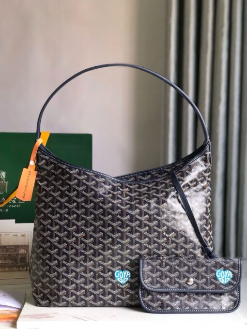 Bohème Hobo Bag. Authentic quality luxury bag crafted in genuine leather comes with authenticity card, dust bag and gift bag. Wander Freely. Carry Elegantly. Introducing the *yard Bohème Hobo Bag—a tribute to Parisian spirit and wanderlust. Inspired by the timber raftsmen’s humble travel pouches, this bag blends heritage storytelling with everyday luxury. Crafted to be exceptionally lightweight and flexible, it drapes effortlessly on your shoulder with a wide, comfortable handle designed for long city strolls or spontaneous weekend escapes. Its beauty lies not only in its sleek silhouette but also in its thoughtful functionality. The secure zip closure keeps your essentials safe, while the removable snap-fastened pouch doubles as a chic clutch or wallet—perfect for a quick dash or stylish switch-up. Whether you’re wandering through cobblestone streets or navigating your daily routine, the Bohème ensures your essentials are always within reach. This is not just a bag—it’s your elegant partner in carefree adventures.