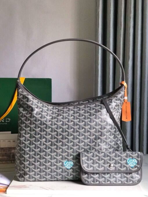 Bohème Hobo Bag. Authentic quality luxury bag crafted in genuine leather comes with authenticity card, dust bag and gift bag. Wander Freely. Carry Elegantly. Introducing the *yard Bohème Hobo Bag—a tribute to Parisian spirit and wanderlust. Inspired by the timber raftsmen’s humble travel pouches, this bag blends heritage storytelling with everyday luxury. Crafted to be exceptionally lightweight and flexible, it drapes effortlessly on your shoulder with a wide, comfortable handle designed for long city strolls or spontaneous weekend escapes. Its beauty lies not only in its sleek silhouette but also in its thoughtful functionality. The secure zip closure keeps your essentials safe, while the removable snap-fastened pouch doubles as a chic clutch or wallet—perfect for a quick dash or stylish switch-up. Whether you’re wandering through cobblestone streets or navigating your daily routine, the Bohème ensures your essentials are always within reach. This is not just a bag—it’s your elegant partner in carefree adventures.
