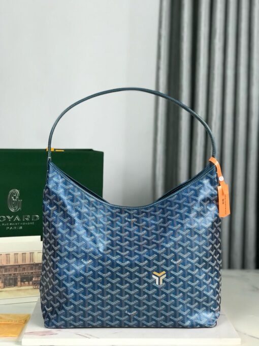 Bohème Hobo Bag. Authentic quality luxury bag crafted in genuine leather comes with authenticity card, dust bag and gift bag. Wander Freely. Carry Elegantly. Introducing the *yard Bohème Hobo Bag—a tribute to Parisian spirit and wanderlust. Inspired by the timber raftsmen’s humble travel pouches, this bag blends heritage storytelling with everyday luxury. Crafted to be exceptionally lightweight and flexible, it drapes effortlessly on your shoulder with a wide, comfortable handle designed for long city strolls or spontaneous weekend escapes. Its beauty lies not only in its sleek silhouette but also in its thoughtful functionality. The secure zip closure keeps your essentials safe, while the removable snap-fastened pouch doubles as a chic clutch or wallet—perfect for a quick dash or stylish switch-up. Whether you’re wandering through cobblestone streets or navigating your daily routine, the Bohème ensures your essentials are always within reach. This is not just a bag—it’s your elegant partner in carefree adventures.