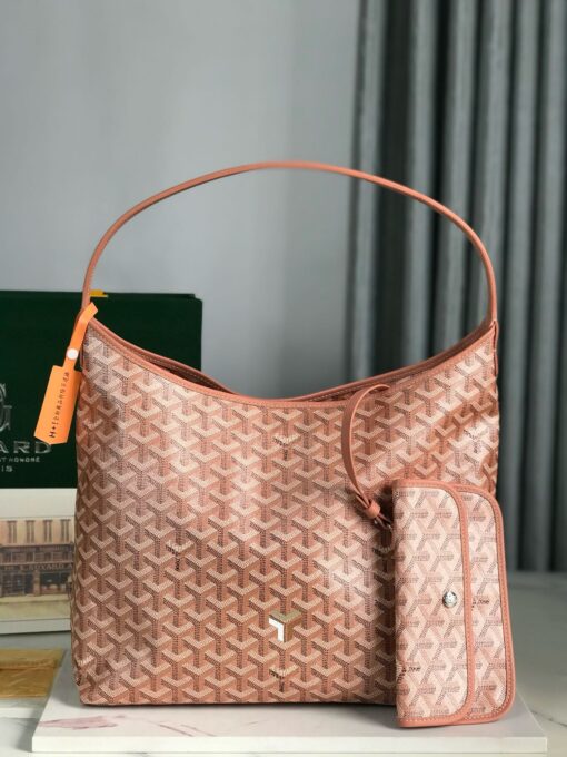 Bohème Hobo Bag. Authentic quality luxury bag crafted in genuine leather comes with authenticity card, dust bag and gift bag. Wander Freely. Carry Elegantly. Introducing the *yard Bohème Hobo Bag—a tribute to Parisian spirit and wanderlust. Inspired by the timber raftsmen’s humble travel pouches, this bag blends heritage storytelling with everyday luxury. Crafted to be exceptionally lightweight and flexible, it drapes effortlessly on your shoulder with a wide, comfortable handle designed for long city strolls or spontaneous weekend escapes. Its beauty lies not only in its sleek silhouette but also in its thoughtful functionality. The secure zip closure keeps your essentials safe, while the removable snap-fastened pouch doubles as a chic clutch or wallet—perfect for a quick dash or stylish switch-up. Whether you’re wandering through cobblestone streets or navigating your daily routine, the Bohème ensures your essentials are always within reach. This is not just a bag—it’s your elegant partner in carefree adventures.