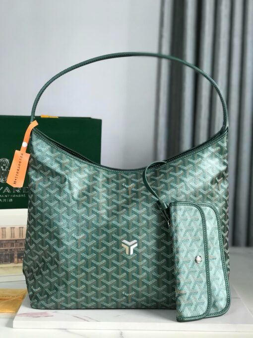 Bohème Hobo Bag. Authentic quality luxury bag crafted in genuine leather comes with authenticity card, dust bag and gift bag. Wander Freely. Carry Elegantly. Introducing the *yard Bohème Hobo Bag—a tribute to Parisian spirit and wanderlust. Inspired by the timber raftsmen’s humble travel pouches, this bag blends heritage storytelling with everyday luxury. Crafted to be exceptionally lightweight and flexible, it drapes effortlessly on your shoulder with a wide, comfortable handle designed for long city strolls or spontaneous weekend escapes. Its beauty lies not only in its sleek silhouette but also in its thoughtful functionality. The secure zip closure keeps your essentials safe, while the removable snap-fastened pouch doubles as a chic clutch or wallet—perfect for a quick dash or stylish switch-up. Whether you’re wandering through cobblestone streets or navigating your daily routine, the Bohème ensures your essentials are always within reach. This is not just a bag—it’s your elegant partner in carefree adventures.