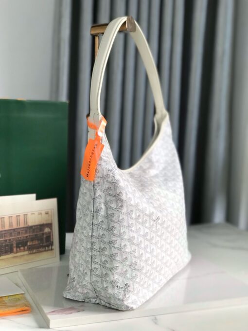 Bohème Hobo Bag. Authentic quality luxury bag crafted in genuine leather comes with authenticity card, dust bag and gift bag. Wander Freely. Carry Elegantly. Introducing the *yard Bohème Hobo Bag—a tribute to Parisian spirit and wanderlust. Inspired by the timber raftsmen’s humble travel pouches, this bag blends heritage storytelling with everyday luxury. Crafted to be exceptionally lightweight and flexible, it drapes effortlessly on your shoulder with a wide, comfortable handle designed for long city strolls or spontaneous weekend escapes. Its beauty lies not only in its sleek silhouette but also in its thoughtful functionality. The secure zip closure keeps your essentials safe, while the removable snap-fastened pouch doubles as a chic clutch or wallet—perfect for a quick dash or stylish switch-up. Whether you’re wandering through cobblestone streets or navigating your daily routine, the Bohème ensures your essentials are always within reach. This is not just a bag—it’s your elegant partner in carefree adventures.