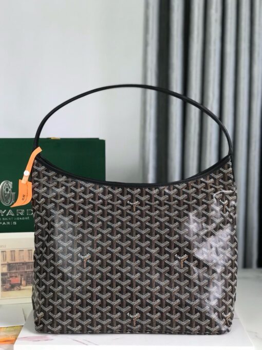 Bohème Hobo Bag. Authentic quality luxury bag crafted in genuine leather comes with authenticity card, dust bag and gift bag. Wander Freely. Carry Elegantly. Introducing the *yard Bohème Hobo Bag—a tribute to Parisian spirit and wanderlust. Inspired by the timber raftsmen’s humble travel pouches, this bag blends heritage storytelling with everyday luxury. Crafted to be exceptionally lightweight and flexible, it drapes effortlessly on your shoulder with a wide, comfortable handle designed for long city strolls or spontaneous weekend escapes. Its beauty lies not only in its sleek silhouette but also in its thoughtful functionality. The secure zip closure keeps your essentials safe, while the removable snap-fastened pouch doubles as a chic clutch or wallet—perfect for a quick dash or stylish switch-up. Whether you’re wandering through cobblestone streets or navigating your daily routine, the Bohème ensures your essentials are always within reach. This is not just a bag—it’s your elegant partner in carefree adventures.